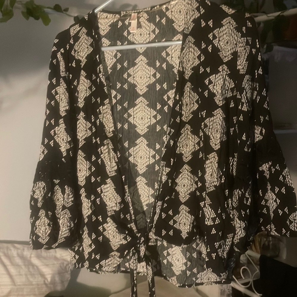 Black and white tie top. Long bell sleeve